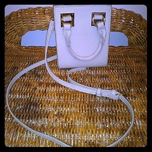 Madison west small cross body purse.